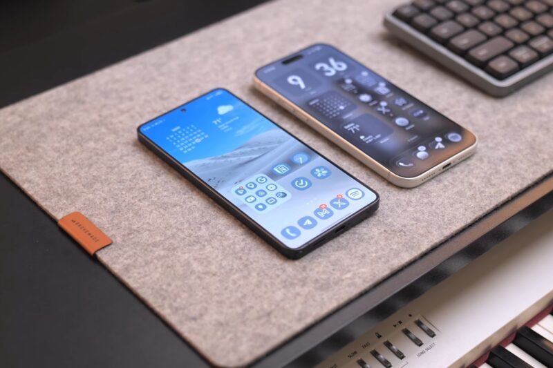 prikaz android i iphone telefona na stolu