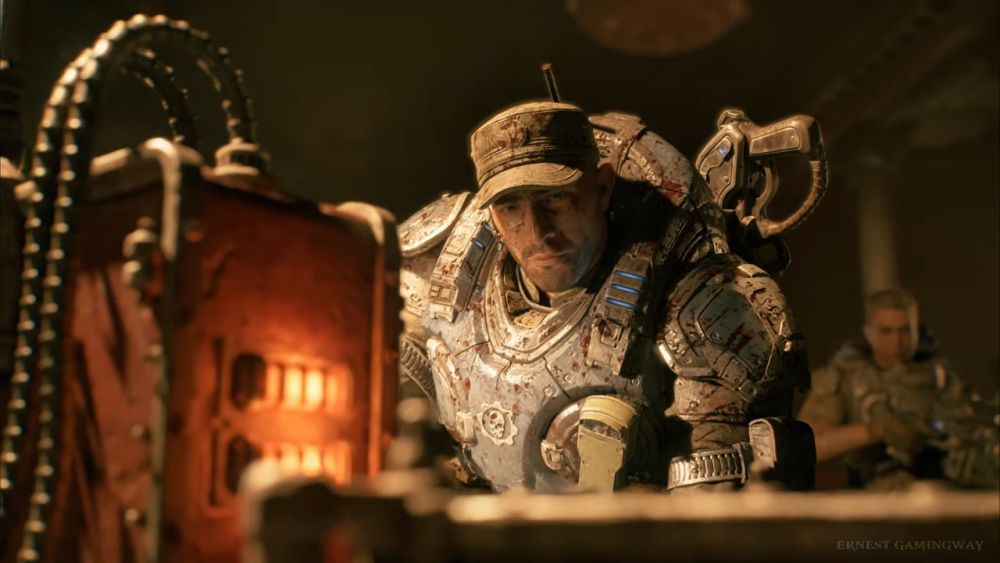 Oklopljeni vojnik koristi komunikacionu opremu u tunelima u igri Gears of War: E-Day.